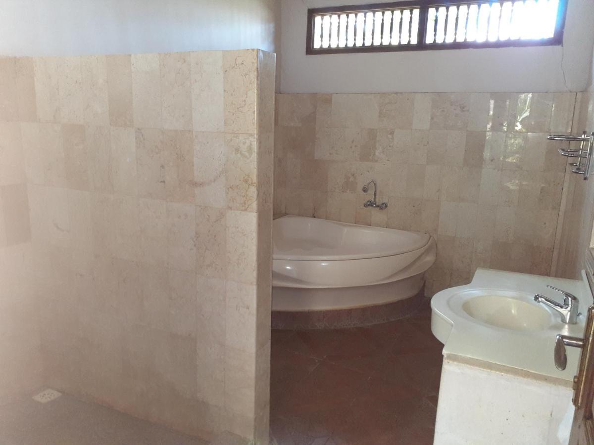 Double One Villas Amed  Exterior photo