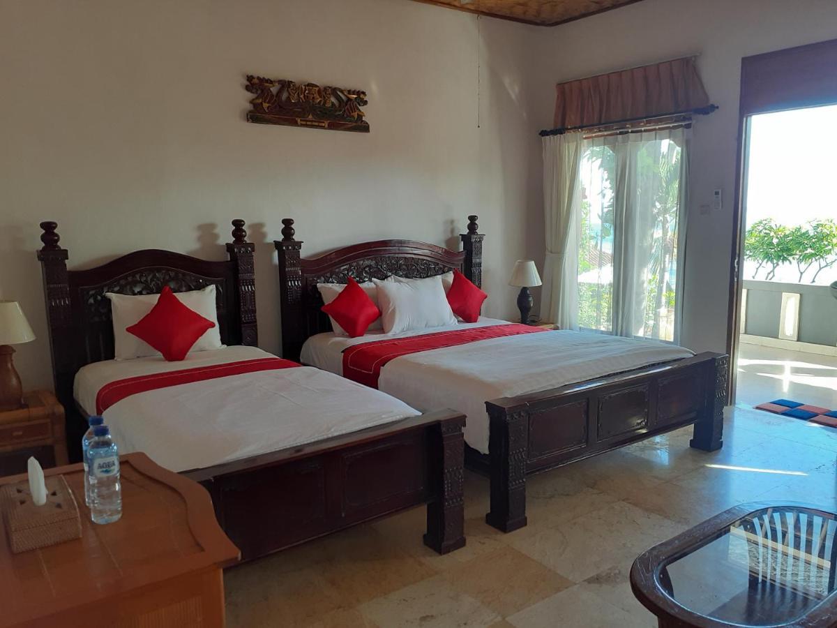 Double One Villas Amed  Exterior photo